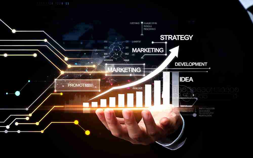 Hand holding hologram with marketing strategy words